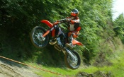 Motocross - Orange KTM in Flight