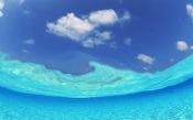 Maldive Islands, Seawater And Blue Cloudy Sky