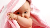 Baby Wrapped In A Towel