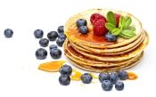 Pancakes with Honey, Blueberries and Raspberries