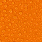 Water Drop on Orange Background