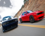 Red and Blue Dodge Challengers on the Road